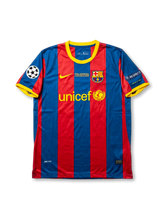 Front view of Barcelona 2011 Champions League Final home shirt in red and blue stripes with UNICEF sponsor, London final embroidery, club crest, and Champions League sleeve patch.