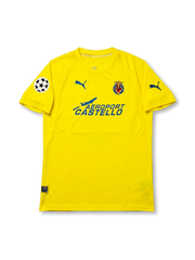 Front view of Villarreal 2005-06 Champions League home shirt with yellow body, club crest, Aeroport Castello sponsor, and UEFA Champions League sleeve patch.