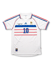 Front view of France 1998 World Cup away shirt with white body, blue and red chest stripes, FFF crest, and #10 front number.