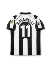 Front view of Juventus 1997-98 Champions League home shirt with black and white stripes, Sony MiniDisc sponsor, Juventus crest, Scudetto shield, and UEFA sleeve patch.