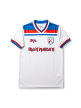 Front view of West Ham United Iron Maiden special edition shirt with white body, claret-blue trim, IMFC detail, Iron Maiden logo, and crossed-hammers crest.