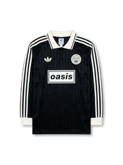 Front view of Adidas Originals x Oasis Live ’25 black long sleeve shirt with white collar, trefoil logo, Oasis chest graphic, and circular Live ’25 patch.