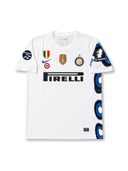 Front view of Inter Milan 2010-11 away shirt with white body, Pirelli sponsor, club crest, FIFA World Champions badge, Champions 2010 sleeve patch, and black-blue side graphic.