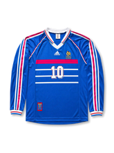 Front view of France 1998 World Cup home long sleeve shirt with blue body, France crest, #10 chest number, white and red chest stripes, and tricolor sleeve detailing.