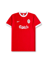 Front view of Liverpool 1998-2000 home shirt with red body, white crew-neck collar, white sleeve trim, Carlsberg sponsor, and Liverpool crest.