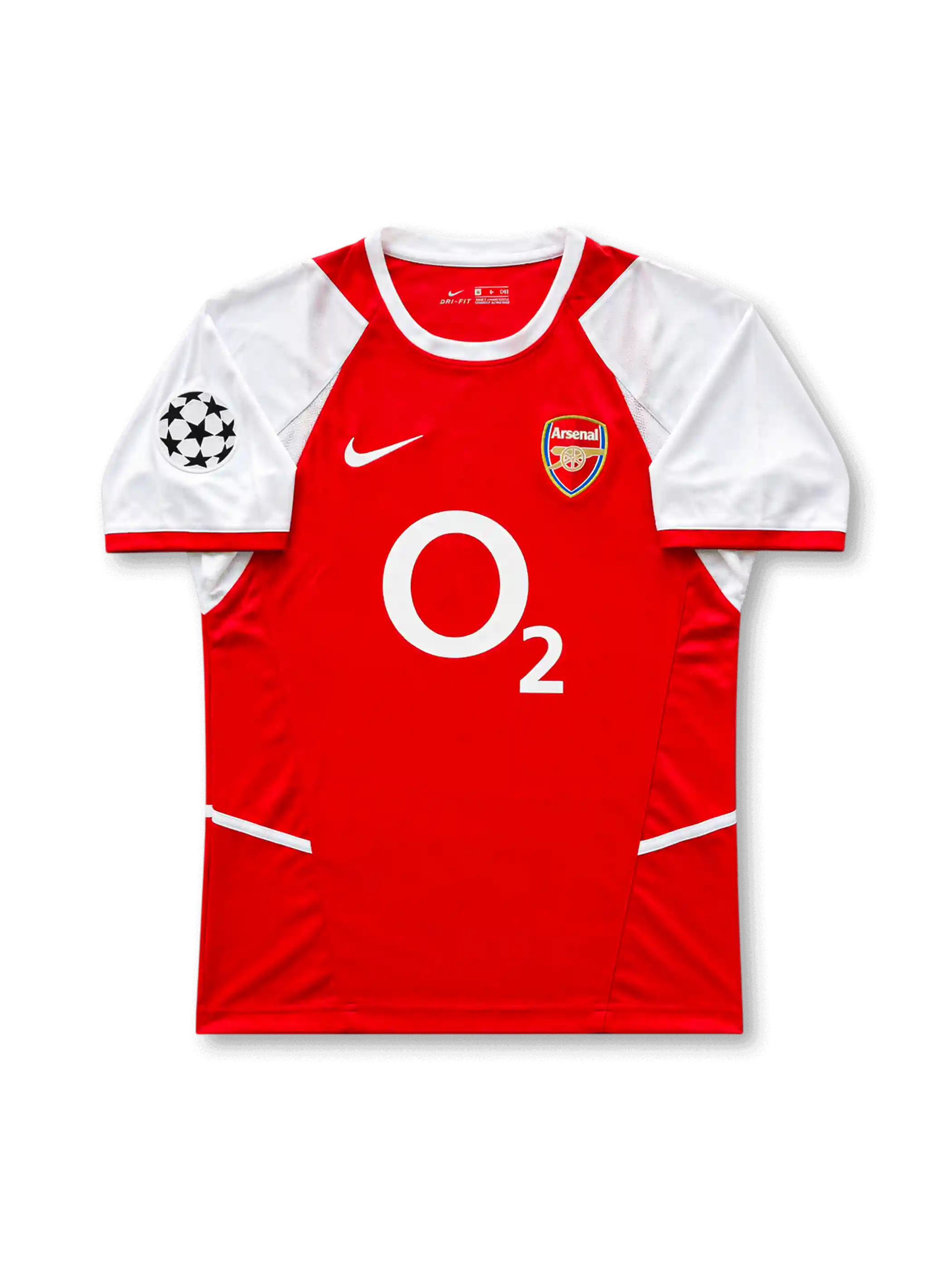 Front view of Arsenal 2002-04 home shirt with red body, white sleeves, O2 sponsor, Arsenal crest, and UEFA Champions League sleeve patch.