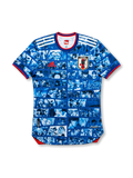 Front view of Japan anime collaboration #10 jersey in blue with manga panel graphics, Japan crest, red trim, and illustrated number detail.