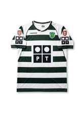Front view of Sporting CP 2002-03 home shirt with green and white hoops, club crest, PT sponsor logo, and Portuguese league sleeve patches.