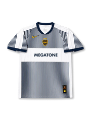 Front view of Boca Juniors 2006-07 away jersey with white and navy pinstripe design, Megatone sponsor, club crest, yellow swoosh detail, and navy collar trim.
