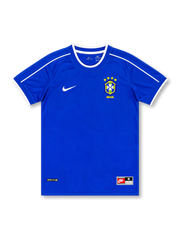 Front view of Brazil 1990s away shirt with royal blue base, CBF crest, white shoulder piping, white sleeve trim, and lower hem label detail.