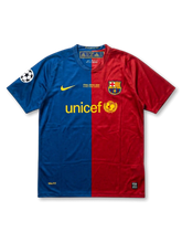 Front view of Barcelona 2009 Rome Final shirt with blue and red half-and-half design, club crest, Unicef sponsor, Rome final embroidery, and Champions League sleeve patch.