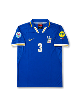 Front view of Italy 1996 home shirt with blue base, Italy crest, central #3 print, fold collar, yellow trim, and tournament sleeve patch detailing.