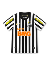2012 Santos home jersey with black and white stripes, Banco BMG sponsor, NETSHOES sleeve details, and Neymar Jr #11 printing