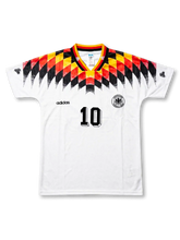 front view of Germany 1994 World Cup home shirt with white body, black red and yellow shoulder graphics, adidas logo, Germany crest, and front number 10