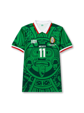front view of Mexico 1998 World Cup home shirt with green Aztec-inspired body graphic, white collar, Mexico crest, ABA Sport branding, and front number 11