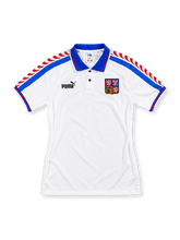 Czech Republic 1996 away jersey, front view, white with blue shoulder stripes and red wave motif, blue polo collar with two-button placket, Puma logo, embroidered national crest, blue sleeve cuffs