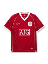 Manchester United 2006/07 home football shirt by Nike with AIG sponsor logo and gold piping