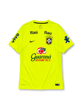 Brazil 2020 training football shirt by Nike in fluorescent yellow-green with multiple sponsor logos