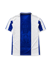 Manchester United 1994/96 third football shirt by Umbro with blue and white stripes and Wembley 1968 text
