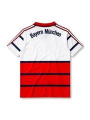 Bayern Munich 1998-2000 away jersey, front view, white upper body and red lower body with navy horizontal stripes, red V-neck collar, black adidas logo, FC Bayern Munchen crest, navy Opel sponsor logo, small tag near bottom hem