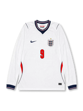 Front view of England 2026 home long sleeve shirt with Harry Kane #9, England crest with one star, and navy V-neck collar.