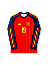 Front view of Spain 2026 home long sleeve shirt with Lamine Yamal #19, Spain crest, and yellow pinstripe design.