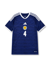 Front view of Scotland 2026 home shirt with number 4, Scotland crest, white shoulder stripes, and blue home design.