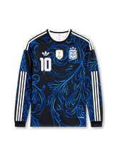 Front view of Argentina 2026 away long sleeve shirt with number 10, Argentina crest, white shoulder stripes, and black-blue graphic design.