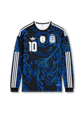 Front view of Argentina 2026 away long sleeve shirt with number 10, Argentina crest, white shoulder stripes, and black-blue graphic design.