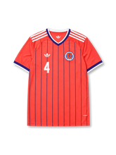 Scotland 2026 away shirt with MCTOMINAY #4, coral-orange body, navy vertical pinstripes, Scotland crest, Trefoil branding, and matching front and back player print.