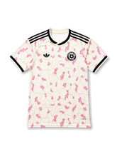 Front view of the Chile 2026–27 away football jersey with pink floral graphics and black trim