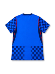 Croatia 2026/27 away shirt with a blue base, dark blue checkered sleeves and lower panels, central Croatia crest, white chest Swoosh, red piping accents, and V-neck collar.