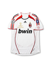 Back view of AC Milan 2007 Champions League Final away shirt with KAKÁ name set and large red number 22.