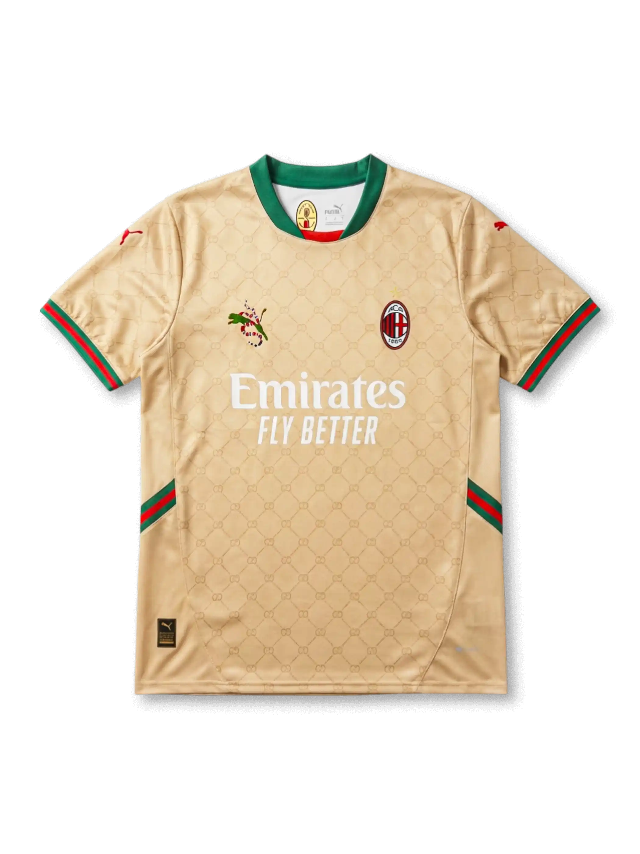 Front view of AC Milan special edition shirt in gold with monogram pattern, Emirates Fly Better sponsor, green collar, and red-green trim accents.