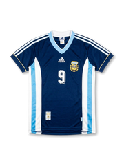 Front view of Argentina 1998 World Cup away shirt in dark navy with light blue V-neck, AFA crest, adidas logo, side panel detailing, and number 9 on the front.