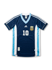 Front view of Argentina 1998 World Cup away shirt in dark navy with light blue V-neck, AFA crest, adidas logo, side panel detailing, and number 10 on the front.