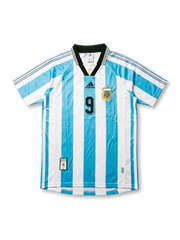Front view of Argentina 1998 World Cup home shirt with sky blue and white stripes, black collar, AFA crest, black chest logo, and number 9 on the front.