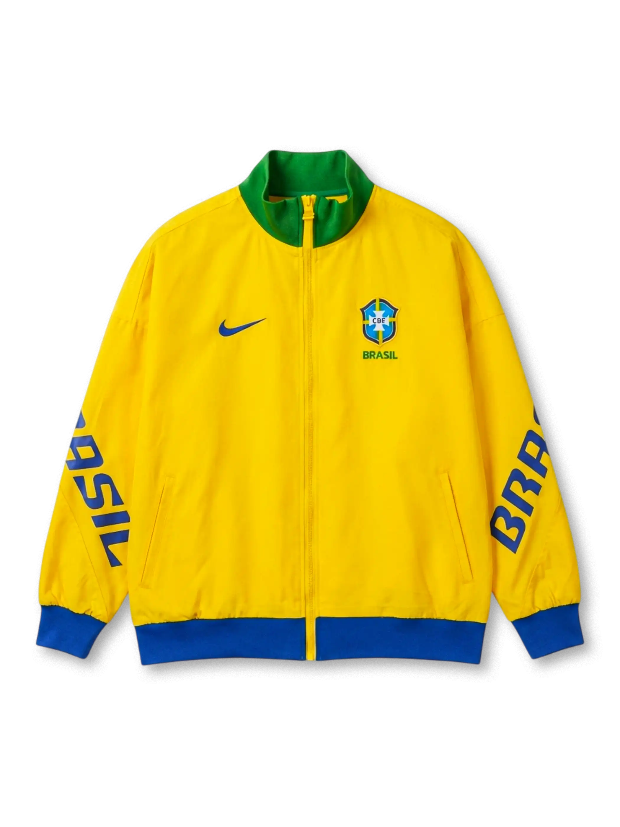Brazil national team Nike track jacket in canary yellow with green stand collar, blue Nike Swoosh at left chest, CBF crest and BRASIL wordmark at right chest, bold BRASIL lettering running down both sleeves in royal blue, blue ribbed cuffs