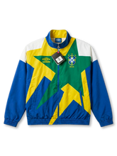 Deadstock 1993/94 Brazil national team Umbro track jacket in yellow, green, blue, and white with star graphic, embroidered CBF crest, and original retail tags attached