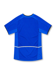 Manchester United 2002/03 royal-blue third jersey with lighter blue side panels, black-trimmed round collar, white Nike Swoosh, club crest and white Vodafone sponsor.