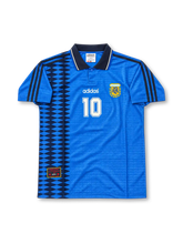 France 1998 FIFA World Cup home jersey featuring Thierry Henry #12, adidas blue soccer shirt with a red chest band, thin white horizontal stripes, white V-neck collar, red white and blue shoulder stripes, France national team rooster crest, white front number 12, and HENRY name with number 12 on the back.