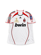 AC Milan 2007 Champions League Final Away Jersey Ronaldo #99, white adidas soccer shirt with red and black accents, bwin sponsor logo and AC Milan crest, retro football jersey.