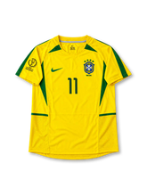 Brazil 2002 World Cup Home Jersey Ronaldinho #11, retro Brazil national team soccer shirt featuring the iconic yellow design with green accents, player name and number 11.