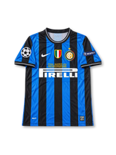 Inter Milan 2010 UEFA Champions League Final Home Jersey Diego Milito #22, classic Nike soccer shirt featuring black and blue vertical stripes, Inter Milan club crest, Pirelli sponsor logo, and Milito name and number 22 on the back.