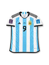 Argentina 2022 FIFA World Cup Final Home Jersey Julián Álvarez #9, adidas national team soccer shirt featuring sky blue and white vertical stripes, Argentina crest, gold World Cup champions details, and Álvarez name and number 9 on the back.
