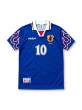 Japan 1997/98 Home Jersey Hiroshi Nanami #10, retro Japan national team soccer shirt featuring a blue base with red flame-inspired details, Japan national team crest, and Nanami name and number 10 on the back.