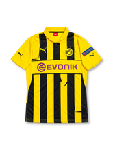 Borussia Dortmund 2012/13 UEFA Champions League Home Jersey Marco Reus #11, classic Puma soccer shirt featuring a yellow base with black accents, Borussia Dortmund club crest, Evonik sponsor logo, and Reus name and number 11 on the back.