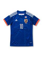 Japan x Captain Tsubasa Special Edition Shirt Tsubasa #10, anime-inspired soccer jersey combining Japan national team colors and Captain Tsubasa character graphics, featuring a distinctive football-themed design inspired by the iconic manga series.
