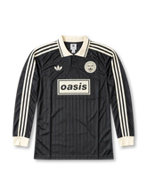 adidas Originals x Oasis Live ’25 Black Long Sleeve Shirt #25, collaborative music-inspired long sleeve featuring a black design, adidas Originals branding, and Oasis Live ’25 tour graphics.