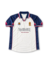 West Ham United Iron Maiden Brave New World special edition soccer jersey #7, featuring a white body with navy raglan sleeves, claret accent panels, striped retro polo collar, West Ham United crest, Iron Maiden Eddie artwork, MAIDEN logo, BRAVE NEW WORLD lettering, and a large stylized number 7 graphic on the back.